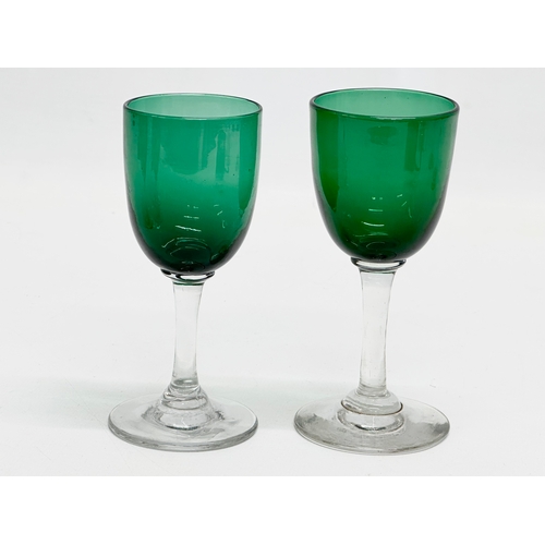 62 - A set of 7 19th Century Victorian Bristol Green and Turquoise port glasses. Circa 1860-1880. 13cm. 1... 