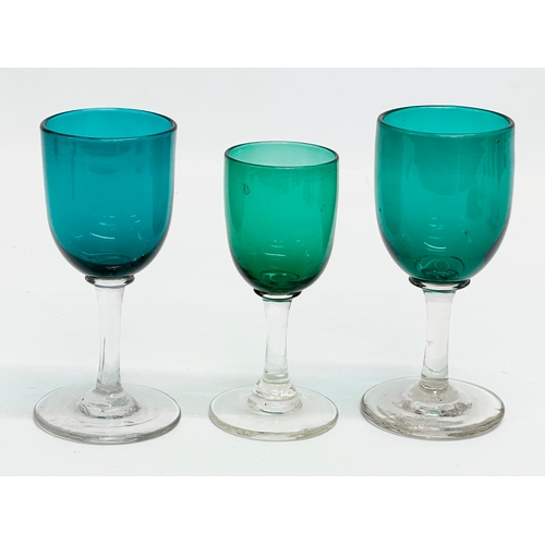 62 - A set of 7 19th Century Victorian Bristol Green and Turquoise port glasses. Circa 1860-1880. 13cm. 1... 