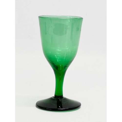 63 - A Late 18th/Early 19th Century Bristol Green gin glass. George III. Circa 1800. 11.5cm