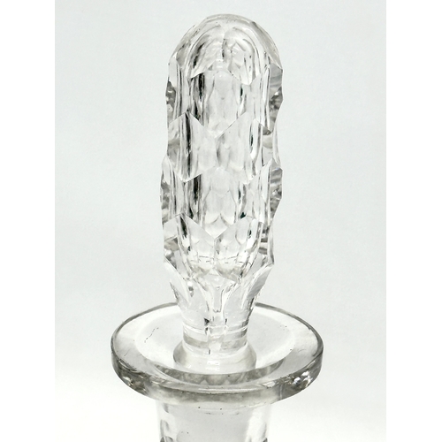 64 - A 19th Century Victorian lens cut decanter. 30.5cm