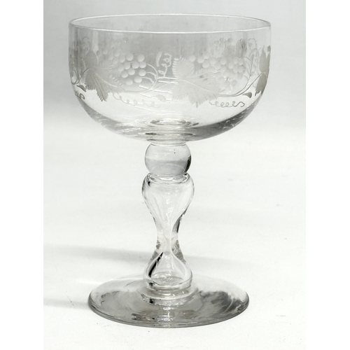 67 - A set of 6 Late 19th Century champagne cocktail glasses with etched autumn leaves and grape vine pat... 