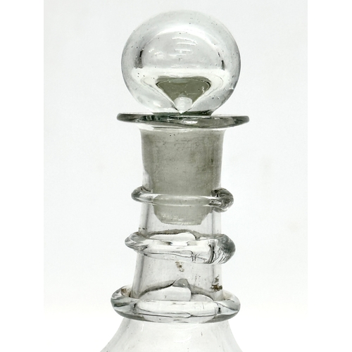 69 - A small George III 18th Century 3 ring glass decanter. Circa 1780-1810. 18.5cm