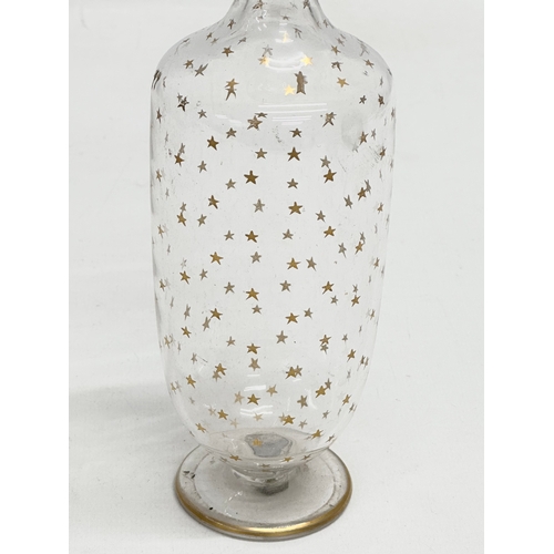 72 - An Early 20th Century French gilt star glass decanter. Circa 1900-1920. 22.5cm