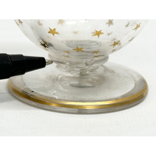 72 - An Early 20th Century French gilt star glass decanter. Circa 1900-1920. 22.5cm