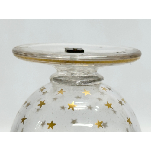 72 - An Early 20th Century French gilt star glass decanter. Circa 1900-1920. 22.5cm