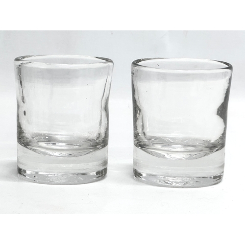 74 - A pair of Late 18th Century George III whisky dram glasses. Circa 1780-1800. 8.5x10cm