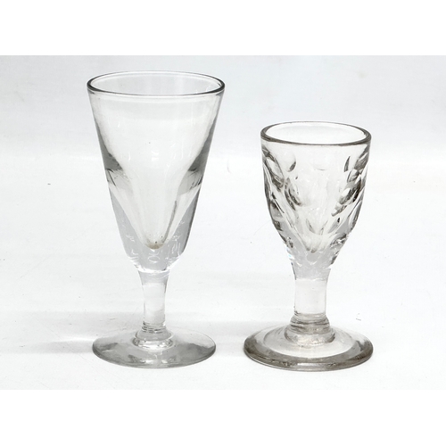 77 - A collection of 19th Century drinking glasses. A French cider glass, circa 1890-1900 13x14cm. A pair... 