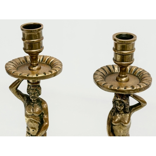 80 - A pair of 19th Century Victorian brass ‘Adam and Eve’ candlesticks. 28cm