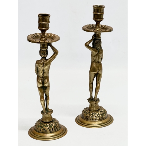 80 - A pair of 19th Century Victorian brass ‘Adam and Eve’ candlesticks. 28cm