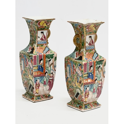 85 - A pair of Mid/Late 19th Century Chinese Canton Famille Rose vases.