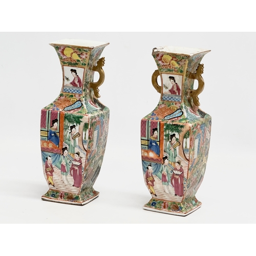 85 - A pair of Mid/Late 19th Century Chinese Canton Famille Rose vases.