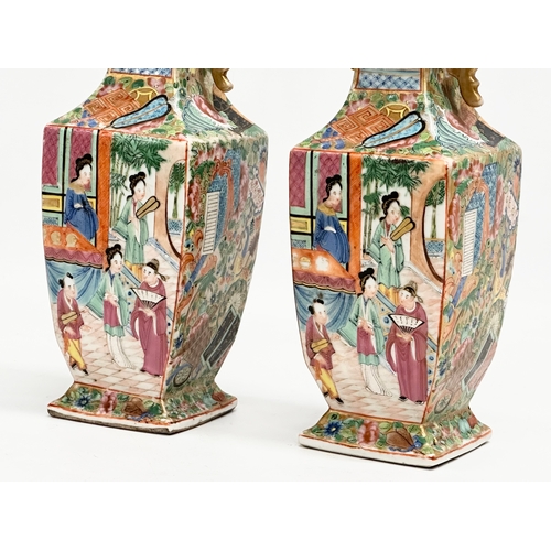 85 - A pair of Mid/Late 19th Century Chinese Canton Famille Rose vases.