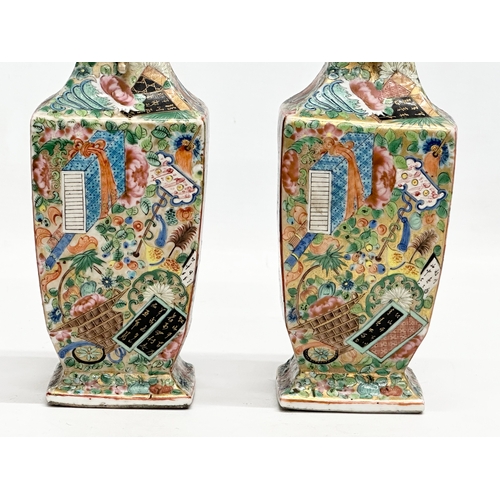 85 - A pair of Mid/Late 19th Century Chinese Canton Famille Rose vases.