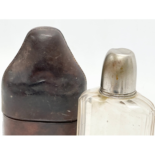 91 - A Late 19th Century Victorian hip flask with leather case. 17.5cm