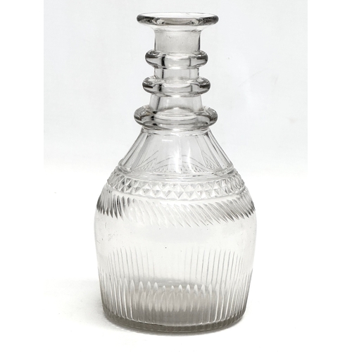 93 - A small Early 19th Century decanter, together with 2 Early 20th Century decanters. A George III/Rege... 