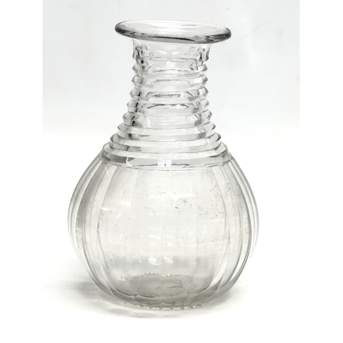 93 - A small Early 19th Century decanter, together with 2 Early 20th Century decanters. A George III/Rege... 