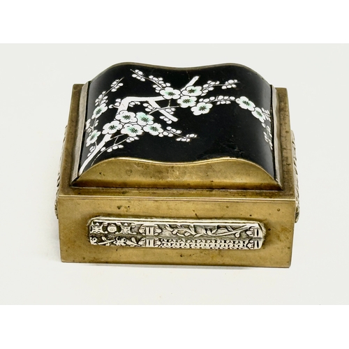 97 - An Early 20th Century Chinese brass and enamel cigarette/trinket box. 9x8x5cm