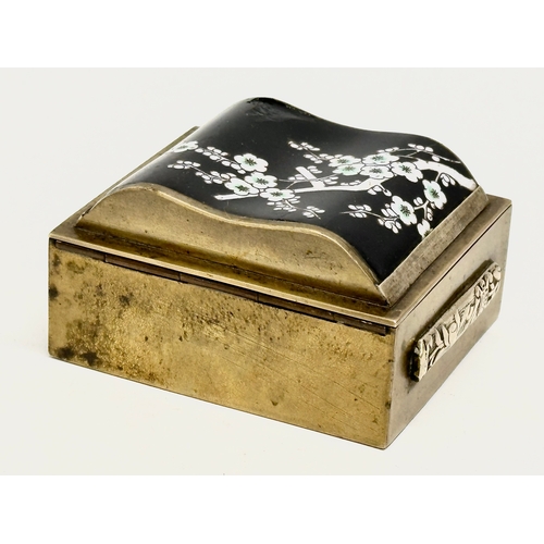 97 - An Early 20th Century Chinese brass and enamel cigarette/trinket box. 9x8x5cm