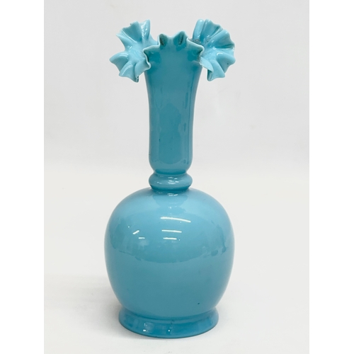 112 - A collection of Mid 19th Century Opaline glass vases. 20cm