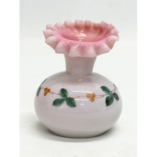 112 - A collection of Mid 19th Century Opaline glass vases. 20cm