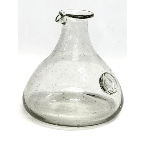 103 - A large Early 19th Century hand blown carafe decanter. Circa 1800. 20x20cm