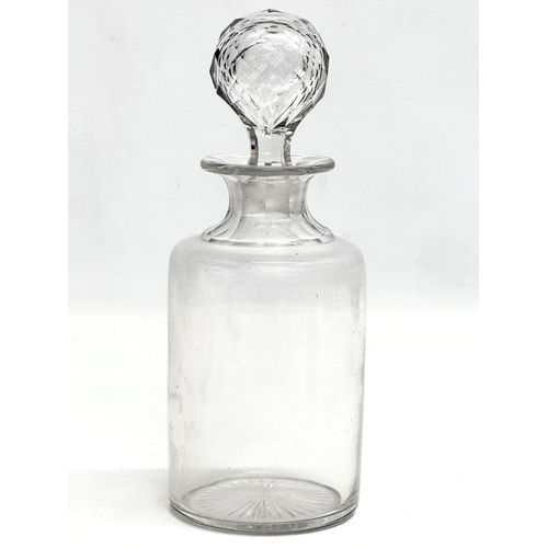 107 - A Victorian glass decanter. 23cm