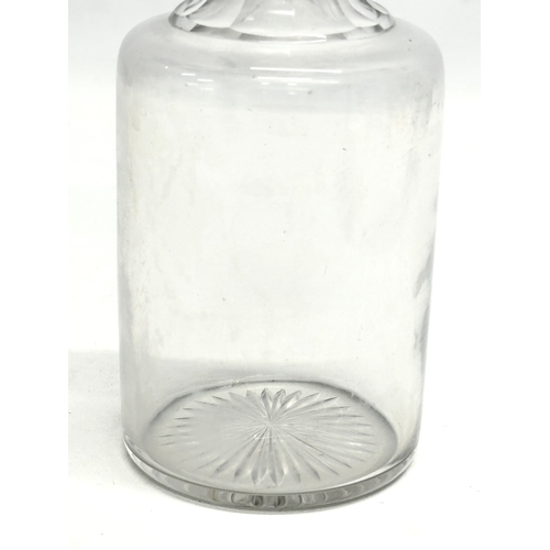 107 - A Victorian glass decanter. 23cm