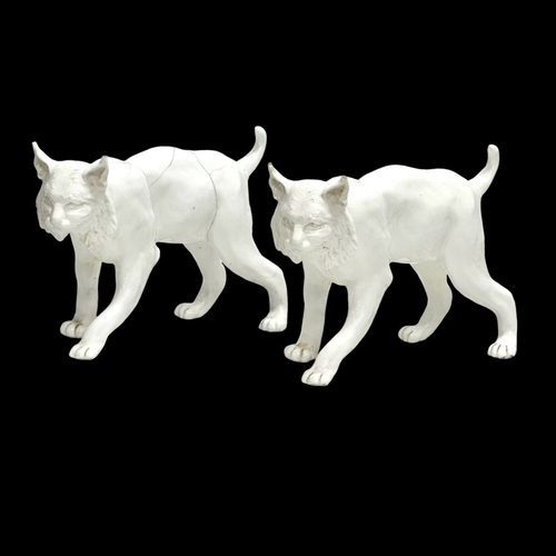 121 - A pair of Late 19th Century pottery wildcats. 18x12cm