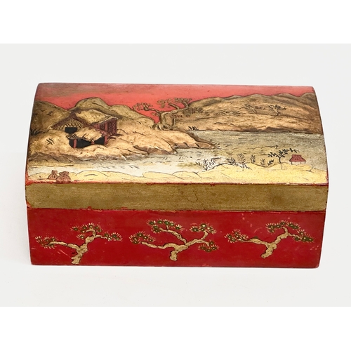 6 - A Late 19th Century Japanese style tea caddy with embossed hand painted mountains, trees and pagodas... 