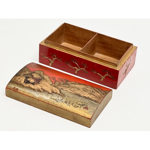 6 - A Late 19th Century Japanese style tea caddy with embossed hand painted mountains, trees and pagodas... 