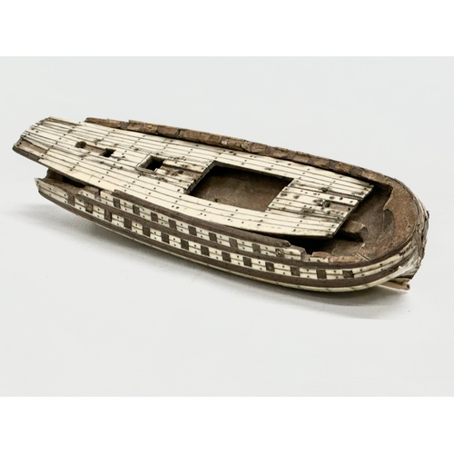 40 - An Early 19th Century Napoleonic Prisoner of War ship. Bone over wood. Circa 1800-1815. 15.5x5x4cm