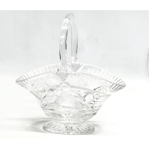 122 - A 1930’s John Walsh cut crystal basket style bowl. 17x11x18cm