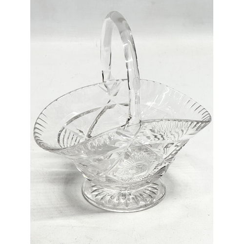 122 - A 1930’s John Walsh cut crystal basket style bowl. 17x11x18cm