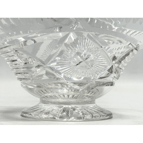 122 - A 1930’s John Walsh cut crystal basket style bowl. 17x11x18cm