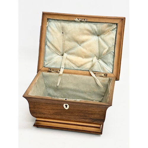 98 - A Regency rosewood sarcophagus jewellery box with Mother of Pearl escutcheon and brass ring handle. ... 