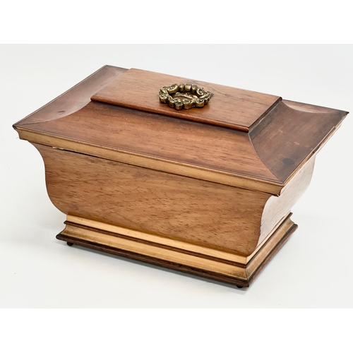 98 - A Regency rosewood sarcophagus jewellery box with Mother of Pearl escutcheon and brass ring handle. ... 