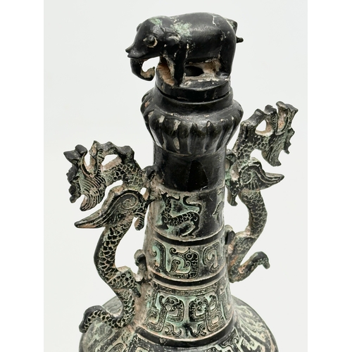 116 - A large 19th Century Chinese bronze pot with lid. 34cm