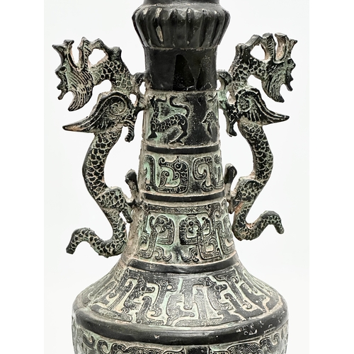 116 - A large 19th Century Chinese bronze pot with lid. 34cm