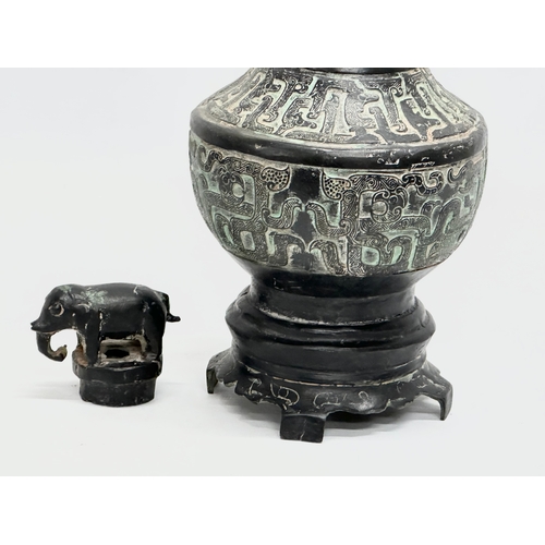 116 - A large 19th Century Chinese bronze pot with lid. 34cm