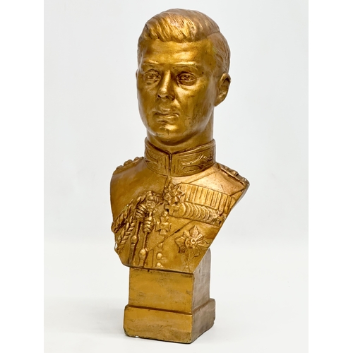 117 - Ernest Shone Jones. A large bust of King George VI sculpted by Ernest Shone Jones. 32cm