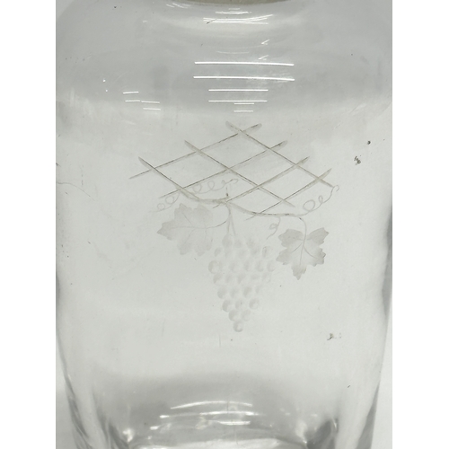 127 - A signed crystal decanter designed by Vicke Lindstrand for Orrefors. 1930-1950. 23cm