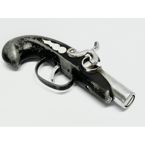 406 - A 20th Century flintlock lighter pistol. 14cm