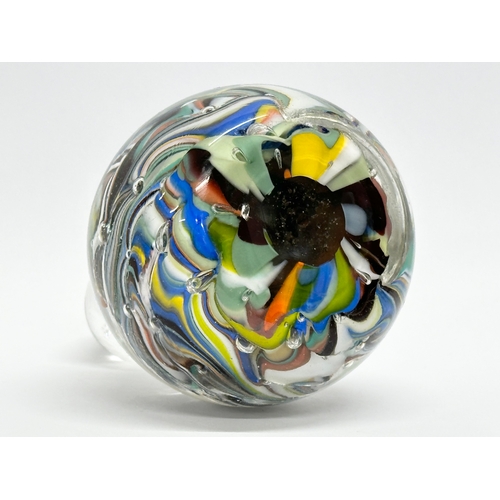 412 - A large Mid 20th Century hand blown glass paperweight. 12cm