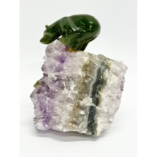 407 - A Jade bear and salmon on carved amethyst base. 8x11cm