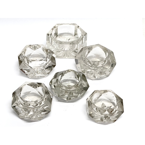 128 - A collection of 19th Century cut glass salt cellars. Georgian and Victorian.