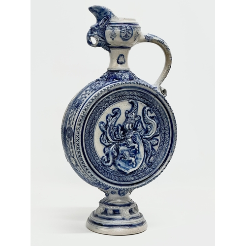 135 - A large Late 19th Century Westerwald salt glazed ewer. 23x46cm