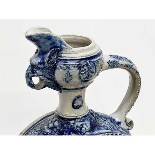 135 - A large Late 19th Century Westerwald salt glazed ewer. 23x46cm