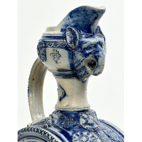 135 - A large Late 19th Century Westerwald salt glazed ewer. 23x46cm