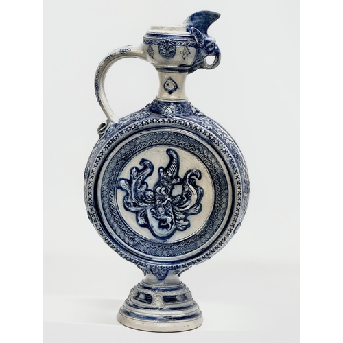 135 - A large Late 19th Century Westerwald salt glazed ewer. 23x46cm