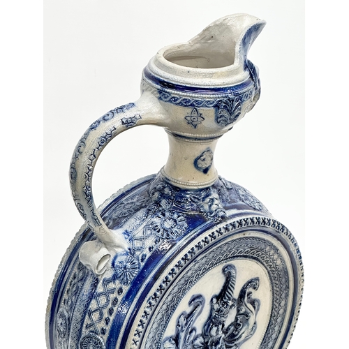 135 - A large Late 19th Century Westerwald salt glazed ewer. 23x46cm